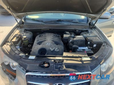 Zdjęcie 12 z 13 samochodu: 2007 HYUNDAI SANTA FE SE VIN:5NMSH13E47H127682 - miniatura