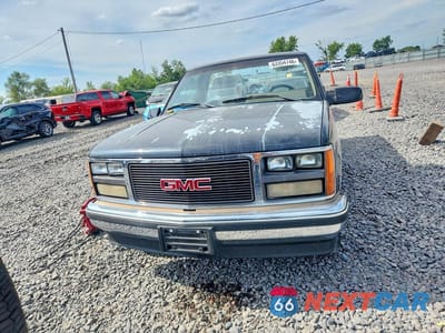 Piąte zdjęcie samochodu w środku: 1989 GMC SIERRA C1500 VIN:1GTDC14H2KZ530239 - miniatura