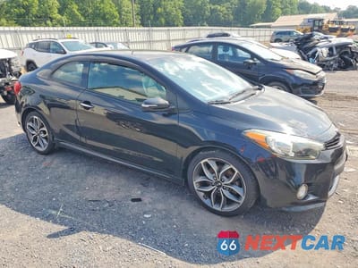 Czwarte zdjęcie samochodu z boku: 2016 KIA FORTE KOUP SX VIN:KNAFZ6A3XG5580508 - miniatura