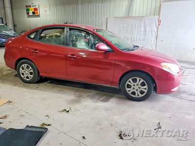 Czwarte zdjęcie samochodu z boku: 2010 HYUNDAI ELANTRA GLS VIN:KMHDU4AD7AU157965 - miniatura