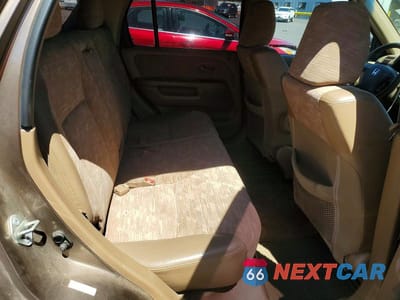 Zdjęcie 10 z 12 samochodu: 2004 HONDA CR-V LX VIN:JHLRD68434C007800 - miniatura
