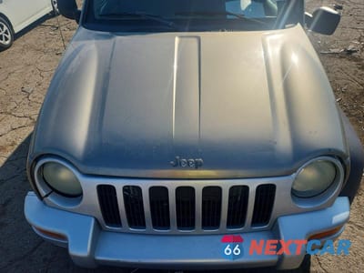 Zdjęcie 12 z 13 samochodu: 2004 JEEP LIBERTY SPORT VIN:1J4GL48K74W190279 - miniatura