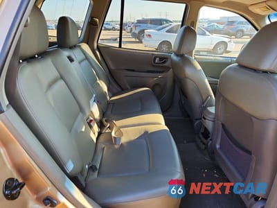 Zdjęcie 11 z 13 samochodu: 2002 HYUNDAI SANTA FE GLS VIN:KM8SC73D32U314028 - miniatura