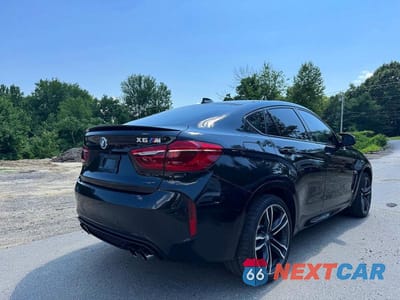 Czwarte zdjęcie samochodu z boku: 2017 BMW X6 M VIN:5YMKW8C36H0U72380 - miniatura
