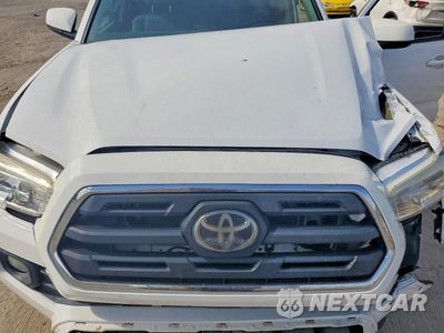 Zdjęcie 11 z 12 samochodu: 2019 TOYOTA TACOMA SR5 V6 VIN:3TMCZ5AN0KM210530 - miniatura
