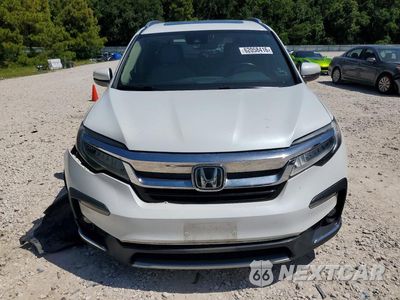 Piąte zdjęcie samochodu w środku: 2020 HONDA PILOT TOURING VIN:5FNYF5H92LB026042 - miniatura