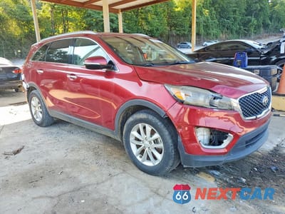 Czwarte zdjęcie samochodu z boku: 2018 KIA SORENTO LX V6 VIN:5XYPG4A56JG389265 - miniatura