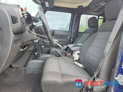 Zdjęcie 7 z 13 samochodu: 2013 JEEP WRANGLER UNLIMITED RUBICON VIN:1C4BJWFG3DL512854 - miniatura