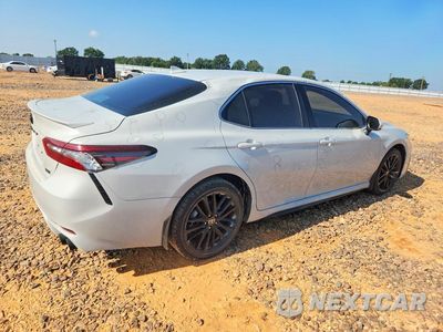 Trzecie zdjęcie samochodu z tyłu: 2024 TOYOTA CAMRY XSE VIN:4T1K61AK5RU209166 - miniatura