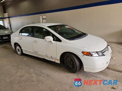 Czwarte zdjęcie samochodu z boku: 2007 HONDA CIVIC HYBRID VIN:JHMFA36217S014388 - miniatura