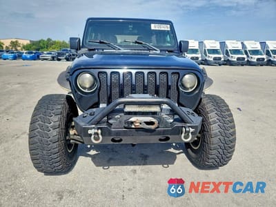 Piąte zdjęcie samochodu w środku: 2020 JEEP WRANGLER UNLIMITED SPORT VIN:1C4HJXDN0LW199230 - miniatura