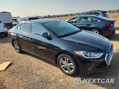 Czwarte zdjęcie samochodu z boku: 2017 HYUNDAI ELANTRA VALUE EDITION VIN:5NPD84LF0HH173534 - miniatura