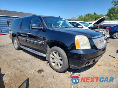 Czwarte zdjęcie samochodu z boku: 2007 GMC YUKON XL DENALI VIN:1GKFK668X7J385127 - miniatura
