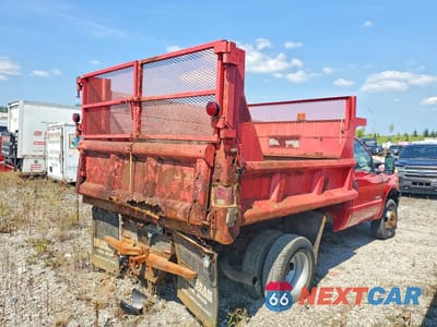Trzecie zdjęcie samochodu z tyłu: 2007 FORD F350 SUPER DUTY DUMP TRUCK VIN:1FDWF37P07EB40605 - miniatura