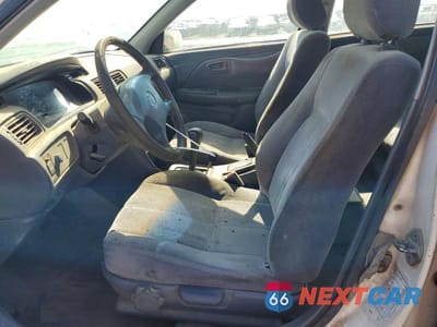 Zdjęcie 7 z 12 samochodu: 1998 TOYOTA CAMRY LE VIN:JT2BG22K4W0116477 - miniatura