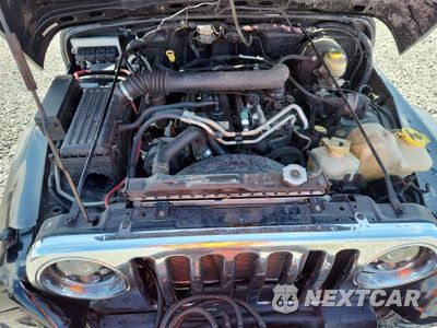 Zdjęcie 11 z 12 samochodu: 2006 JEEP WRANGLER X VIN:1J4FA39S16P786947 - miniatura