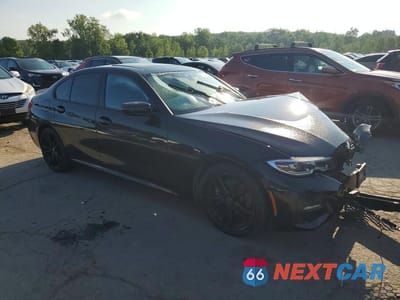 Czwarte zdjęcie samochodu z boku: 2019 BMW 330XI VIN:WBA5R7C52KAJ85786 - miniatura