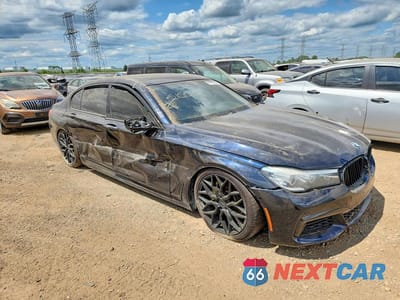 Czwarte zdjęcie samochodu z boku: 2017 BMW 740 XI VIN:WBA7E4C57HGU99328 - miniatura