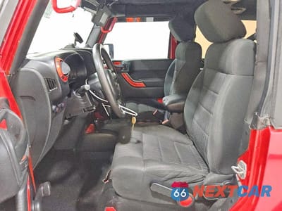 Zdjęcie 7 z 12 samochodu: 2011 JEEP WRANGLER SPORT VIN:1J4AA2D1XBL544369 - miniatura