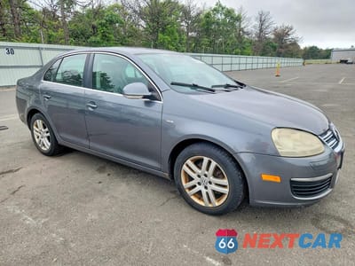 Czwarte zdjęcie samochodu z boku: 2007 VOLKSWAGEN JETTA WOLFSBURG VIN:3VWEG71KX7M181784 - miniatura