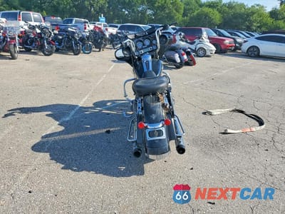 Czwarte zdjęcie samochodu z boku: 2010 HARLEY-DAVIDSON FLHX VIN:1HD1KB417AB643320 - miniatura