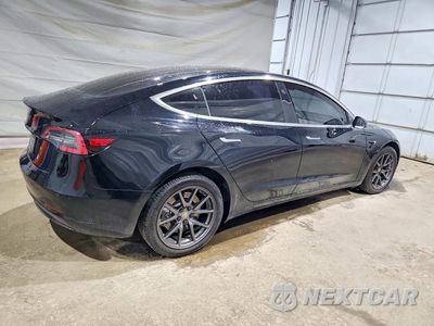 Trzecie zdjęcie samochodu z tyłu: 2019 TESLA MODEL 3 VIN:5YJ3E1EA9KF304289 - miniatura