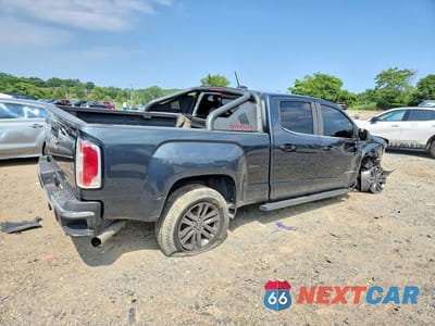Trzecie zdjęcie samochodu z tyłu: 2018 GMC CANYON SLE VIN:1GTP6CE1XJ1186707 - miniatura