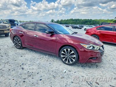 Czwarte zdjęcie samochodu z boku: 2016 NISSAN MAXIMA 3.5 SR VIN:1N4AA6APXGC441696 - miniatura
