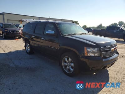 Czwarte zdjęcie samochodu z boku: 2007 CHEVROLET SUBURBAN K1500 VIN:1GNFK16387R349609 - miniatura