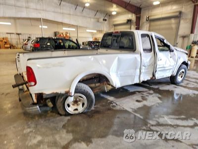 Trzecie zdjęcie samochodu z tyłu: 2000 FORD F150 VIN:1FTRX18L1YNA22529 - miniatura