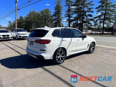 Czwarte zdjęcie samochodu z boku: 2021 BMW X5 XDRIVE45E VIN:5UXTA6C08M9D84086 - miniatura