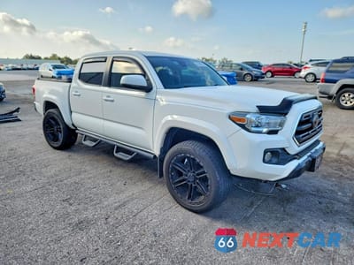 Czwarte zdjęcie samochodu z boku: 2018 TOYOTA TACOMA SR5 V6 VIN:3TMAZ5CN9JM075552 - miniatura