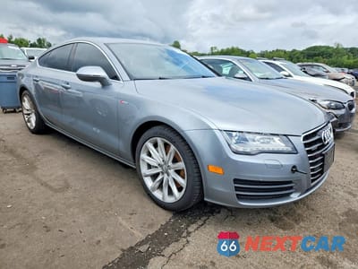 Czwarte zdjęcie samochodu z boku: 2014 AUDI A7 PREMIUM PLUS VIN:WAUWGAFC5EN064670 - miniatura