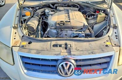 Zdjęcie 12 z 14 samochodu: 2004 VOLKSWAGEN TOUAREG VIN:WVGBC67L74D038239 - miniatura