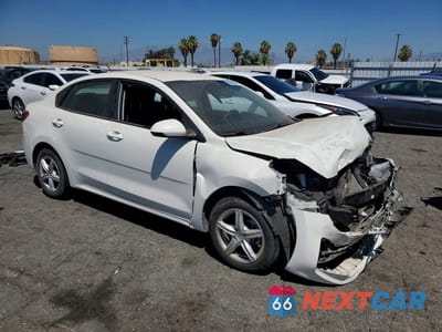 Czwarte zdjęcie samochodu z boku: 2022 KIA RIO S VIN:3KPA24AD1NE462850 - miniatura