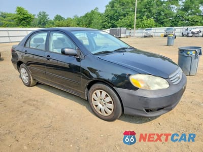 Czwarte zdjęcie samochodu z boku: 2003 TOYOTA COROLLA LE VIN:2T1BR32E73C112765 - miniatura