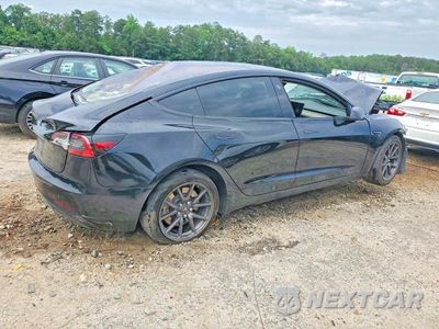 Trzecie zdjęcie samochodu z tyłu: 2018 TESLA MODEL 3 VIN:5YJ3E1EA5JF033035 - miniatura