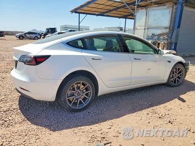 Trzecie zdjęcie samochodu z tyłu: 2019 TESLA MODEL 3 VIN:5YJ3E1EA7KF425208 - miniatura