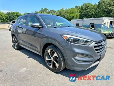 Czwarte zdjęcie samochodu z boku: 2018 HYUNDAI TUCSON VALUE VIN:KM8J3CA25JU691996 - miniatura