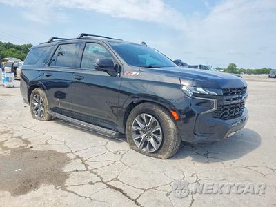 Czwarte zdjęcie samochodu z boku: 2024 CHEVROLET TAHOE K1500 Z71 VIN:1GNSKPKL9RR302468 - miniatura
