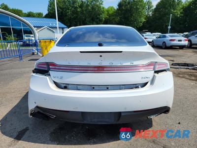 Zdjęcie 6 z 12 samochodu: 2015 LINCOLN MKZ HYBRID VIN:3LN6L2LUXFR611489 - miniatura