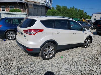 Trzecie zdjęcie samochodu z tyłu: 2014 FORD ESCAPE TITANIUM VIN:1FMCU0JXXEUE00107 - miniatura