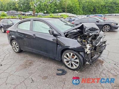 Czwarte zdjęcie samochodu z boku: 2017 HYUNDAI ACCENT VALUE EDITION VIN:KMHCT4AE0HU355403 - miniatura