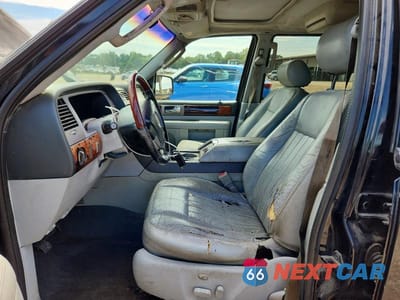 Zdjęcie 7 z 14 samochodu: 2004 LINCOLN NAVIGATOR VIN:5LMFU27R04LJ22479 - miniatura