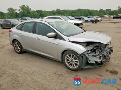 Czwarte zdjęcie samochodu z boku: 2018 FORD FOCUS SE VIN:1FADP3FE0JL254248 - miniatura