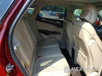 Zdjęcie 11 z 14 samochodu: 2019 LINCOLN MKC RESERVE VIN:5LMCJ3D97KUL20490 - miniatura