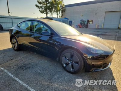Czwarte zdjęcie samochodu z boku: 2023 TESLA MODEL 3 VIN:5YJ3E1EA1PF566721 - miniatura