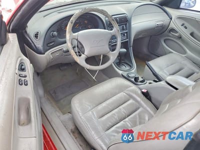 Zdjęcie 8 z 12 samochodu: 1998 FORD MUSTANG VIN:1FAFP4044WF194141 - miniatura