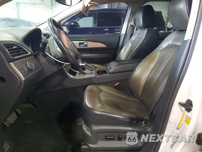 Zdjęcie 7 z 13 samochodu: 2013 LINCOLN MKX VIN:2LMDJ8JK7DBL22216 - miniatura