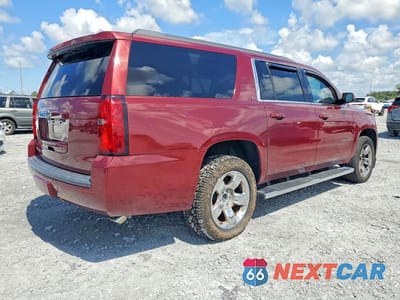 Trzecie zdjęcie samochodu z tyłu: 2019 CHEVROLET SUBURBAN C1500 LT VIN:1GNSCHKC0KR395423 - miniatura